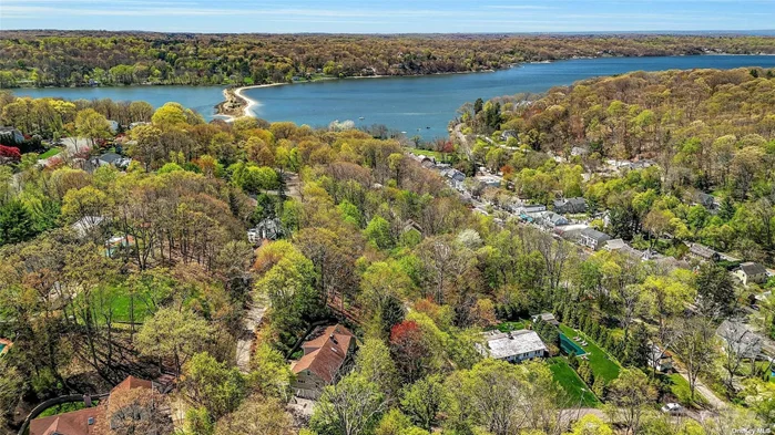 Welcome to this warm and inviting home in the heart of Cold Spring Harbor. Located on a quiet tree lined street a few blocks from SD#2 Cold Spring Harbor Jr./Sr. High school. A stone&rsquo;s throw from Main Street with Village shops, Restaurants, Library, Waterfront parks, Hiking trails and much more to enjoy. A boaters delight with Marina near by and Eagle Dock Beach mooring rights. Two-story foyer with skylight welcomes you to a sun-soaked interior. Oversized windows in the Formal living & dining rooms allow for natural light to cascade throughout the home. Gourmet Eat in kitchen with high end appliances, granite countertops, a large center island, as well as breakfast nook. Gorgeous hardwood floors throughout. Wood burning fireplace in the comfortably spacious family room, with sliding glass doors to the back deck and flat manicured yard. Off the foyer you will find a perfect room for a home office or guest bedroom with a second fireplace. Primary bedroom is on main level with walk-in closets, Ensuite standup shower, and jacuzzi tub makes for a spa like atmosphere. Second floor has 3 bedrooms 1 full bath. Closets are deep with plenty of storage space. Unfinished attic is expansive and has lots of potential to be built out. Full finished basement allows easy access to the home through large 3 car garage. Pristine landscaping makes the backyard a private paradise great for entertaining. Nearby Eagle Dock Beach, kayak storage, and Mooring rights.(Dues req&rsquo;d)