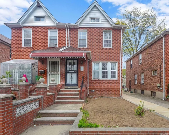 Beautiful 3 bedroom brick colonial in the heart of Queens Village. Oversized living room and dining room, large bedrooms, hardwood floors throughout, bright and airy living space, full finished basement with outside entrance, solar panels, private driveway and detached garage.
