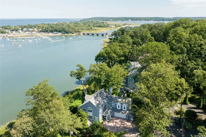 Prepare to be swept away by the epitome of waterfront living in the highly coveted Mill Neck Estates. With your very own private beach access, this exquisite sanctuary offers a unique opportunity to embrace waterfront living at its finest. Gaze out from any of the three levels, and be enchanted by the ever-changing views of Mill Neck Creek. As you step inside, the open layout unfolds before you, creating a vibrant atmosphere that&rsquo;s perfect for entertaining. Fabulous views surround the formal living room to the Chef&rsquo;s Kitchen. New Stainless Steel Appliances, ample cabinet space and an inviting center island make this the true heart of the home. Step outside from the main level to a panoramic perch that allows you to savor the waterfront&rsquo;s ever-changing beauty. For more outdoor entertainment, the covered patio below offers a secluded retreat. The primary ensuite boasts soaring ceilings and a private balcony that serves as your personal front-row seat to awe-inspiring sunrises and sunsets. With a total of five bedrooms, each featuring walk-in closets, and 4.5 bathrooms, this home effortlessly combines style with functionality. Private beach, kayak racks and mooring rights elevate your waterfront experience. Bonus 1, 000-gallon propane tank to support full home generator, gas cooking, electric fireplace and fire pit. Every day here could feel like a vacation, where the harmony of the water and the luxury of your surroundings transport you to a world of leisure and delight. This is not just a home; it&rsquo;s a lifestyle. HOA Dues approx $150/monthly