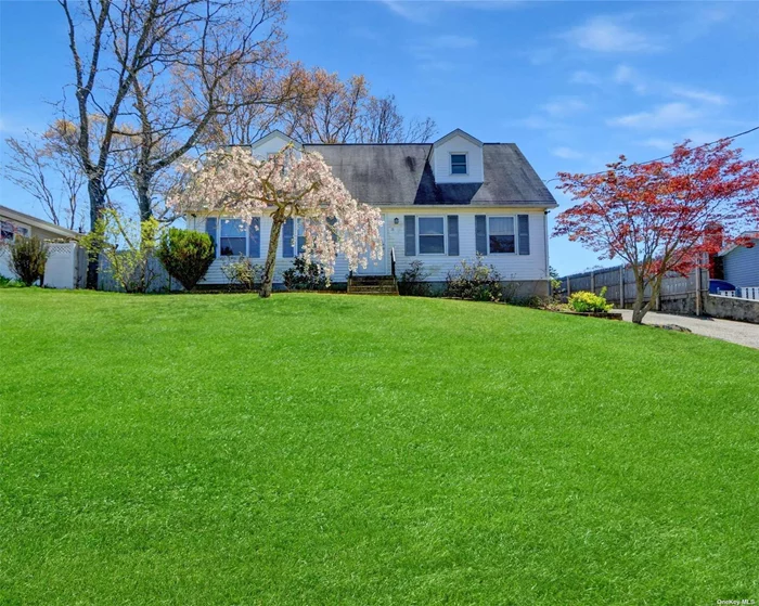 Cape Style Home. This Home Features 4 Bedrooms, 1.5 Baths & Eat In Kitchen. Centrally Located To All. Don&rsquo;t Miss This Opportunity! To help visualize this home&rsquo;s potential, grass photos were digitally enhanced.