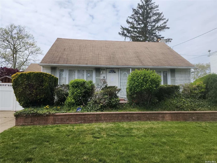 Spacious Dormered Cape with 5 rooms 3 beds and 2 bath and full basement. Hardwood floors as seen. Close to Shopping, Transportation and Major Roadways