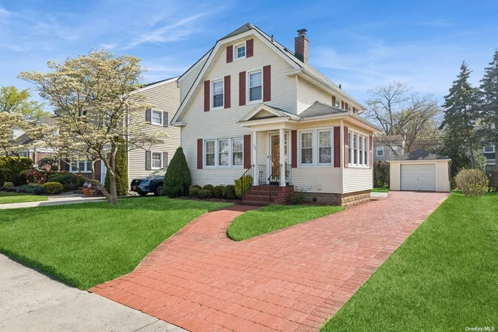 This beautiful colonial in the Western Section of Garden City enjoys a parklike setting on an impressive 80 x 100-foot lot. The home features a foyer, a sitting area, and a spacious living room that flows into the dining room and kitchen. The second floor boasts a primary bedroom with a cathedral ceiling, a full bathroom and 2 additional bedrooms. The basement offers an ample amount of storage space and room for a recreation room. The generously sized lot provides a perfect setting for entertaining and an ideal opportunity for expansion. The home is proximate to the school, park, and 2 Long Island Railroad stations.