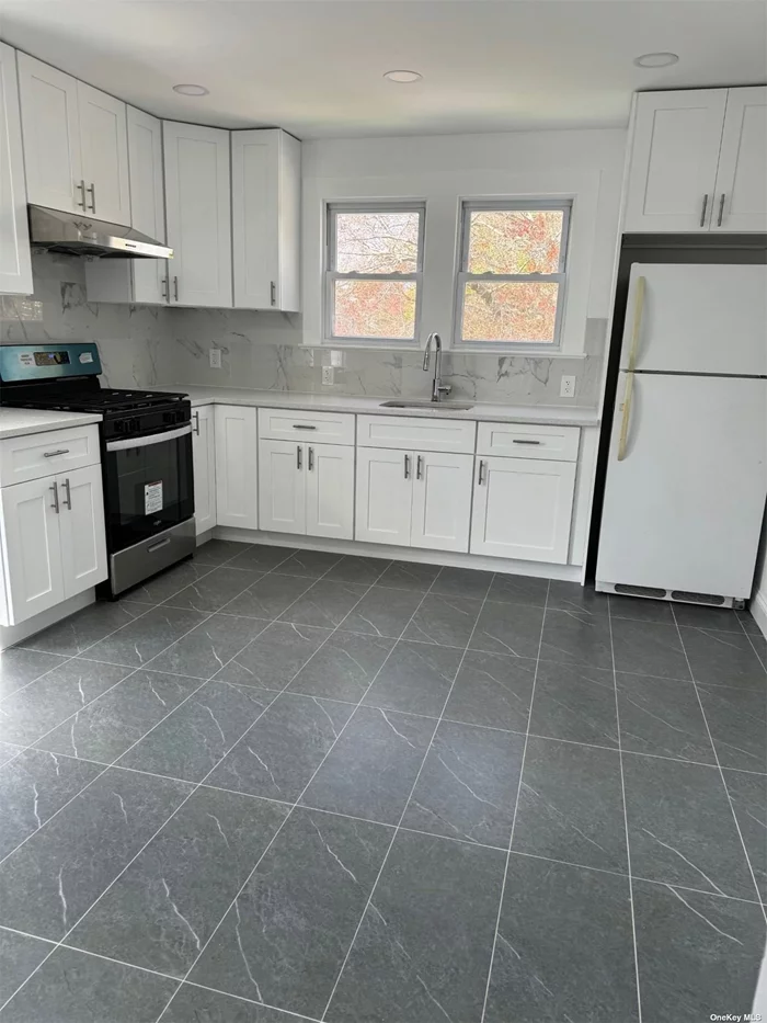 This unit features a newly renovated eat-in kitchen with stainless steal appliances and updated a bathroom. This 2 bedroom includes a shared back yard and private parking. This location is close to several amenities, the Supermarket, Train Station, Restaurants, Laundry and shopping centers. Tenant is responsible for gas and electric.