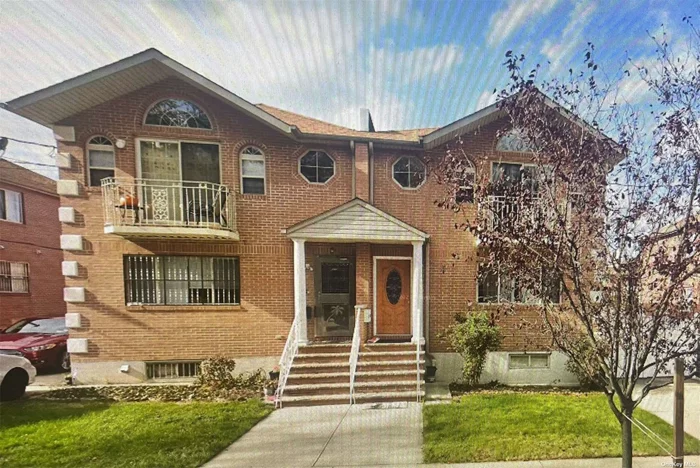 This semi-detached two-family home offers 3 beds and 2 baths on each floor, complete with separate driveways and fully finished basement. With excellent condition and nestled in a peaceful community, it provides convenience with nearby bus stops and easy transportation access.