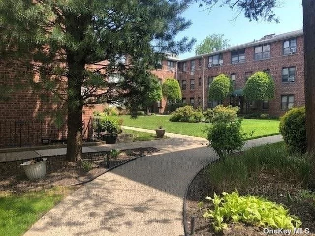 Mint, Bright, Spacious, Quiet 2 BR Counter Unit, First Floor Overlooks Interior Courtyard, 4 Mins to LIRR , Close to Shopping & Restaurants. Wood Floors. Beautiful Move In Apt with Windows in Every Room , Kitchen & Bath.