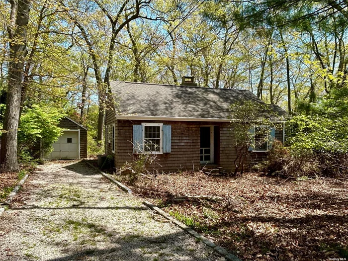 Quaint 2 bedroom cottage located N of 25A on a quiet cul-de-sac, with partial basement, 2 full baths, hardwood floors, fireplace, Gas cooking, Oil heat, 1 car Det garage, in Three Village Sd, Needs TLC, Being Sold As-Is!