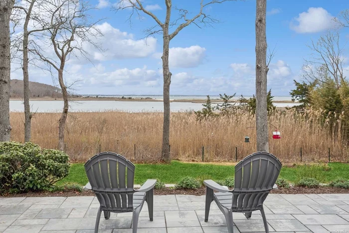 Year Round Serenity Awaits This private, waterfront property offers expansive views of Squires Pond and the Peconic Bay. Enjoy easy access to Squires Pond where you can Kayak or Canoe. Relax with your morning coffee while watching the swans swim by. Large Patio with Bar Area and Dining Area for outdoor entertaining. Centrally located to ocean beaches, Peconid Bay beach, walking trails, Good Ground Park and the best restaurants and shopping the Hamptons has to offer.