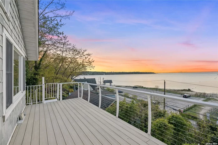 Don&rsquo;t miss this opportunity to own a truly extraordinary property nestled along the picturesque shores of Sea Cliff. 22 Bathway Steps, a stunning cliffside retreat, embodies modern coastal living at its finest with unparalleled waterfront views and unique architectural design. This newly renovated 2-bedroom, 2-bathroom home offers not just a residence but a lifestyle. Greeted by an elevated vantage point, this home boasts 2 wrap around decks for outdoor entertainment and a street level detached 1-car garage, which provides convenience and storage space for vehicles and outdoor gear. Above the garage features an additional space with water views that can be utilized as a serene office, artist&rsquo;s studio, or yoga/meditation space...the possibilities are endless. Imagine leisurely strolls along the sandy shores accessible from the second entrance of the village&rsquo;s renowned Bathway Steps, a beloved local feature that leads directly to the beach. This is your chance to embrace waterfront living in one of Long Island&rsquo;s most sought-after communities.