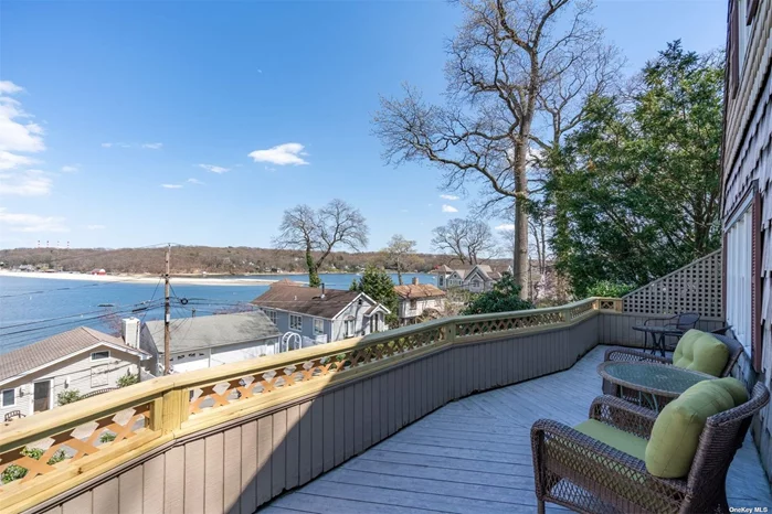 Looking for a beach house? Spectacular year-round panoramic WATER VIEWS of Centerport Harbor, Northport Bay, Asharoken, and Eatons Neck. 80ft wide double lot features hand-crafted slate walls, meandering stone pathways and several entertaining areas, all with fantastic water views. Property extends from McKinley Terrace up to Jackson Crescent, affording additional parking and convenient access to and from both streets! Incredible detached screened 4-season party room, complete with jalousie windows, a wood burning stove, pool table, sitting area and ambient lighting that gives the room a warm glow in the evening. There is also a gazebo, shed and one car detached garage. Private Huntington Beach Community Association (HBCA) with its soft sandy beach, access to boat launch, moorings, kayak/dinghy storage, a clubhouse for parties and numerous amenities and year-round events including Summer Camp, Lobsterfest, Octoberfest, Family Day, 4th of July celebrations, and many more. All just a short walk down the hill towards the water! Where will you be spending your summer!