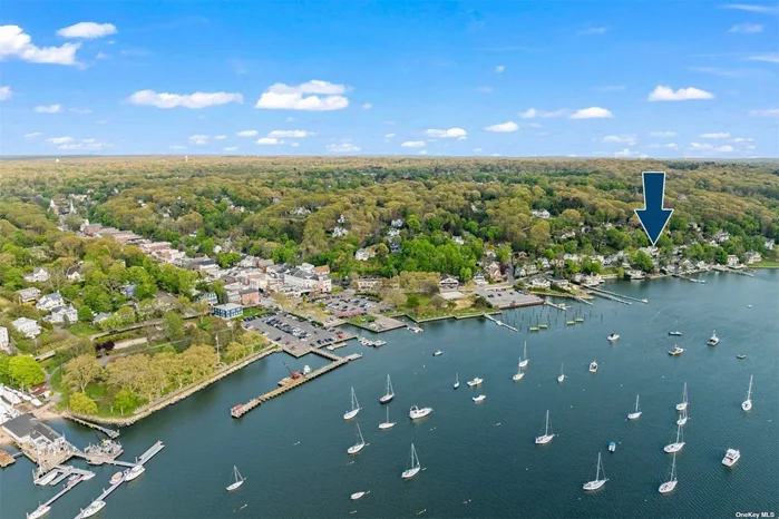 Discover the perfect blend of history, charm, and breathtaking views in Northport Village. This enchanting 1850s Sea Captain&rsquo;s Village Home offers a spectacular waterfront lifestyle feel with year-round, unobstructed panoramic water views of Northport Harbor. The heart of the home, a beautifully designed kitchen, flows seamlessly into the living room featuring an open floor plan ideal for modern living. Step outside onto a charming paver patio-perfect for alfresco dining under the stars and entertaining guests. The formal living rooms feature a wall of expansive windows that beautifully showcase the harbor views, bathing the area in natural light. Adjacent to this room is a charming library, outfitted with sliding doors for privacy-a distinctive feature from the era of the home&rsquo;s construction. Upstairs, each of the three bedrooms boasts its own stunning water view.The home includes a full bathroom on each floor and a bonus room that can serve as your hobby space or home office. Relax on the inviting front porch, sipping your morning coffee as the day begins, and later, enjoy front-row seats to spectacular western sunsets.  This home stands out with its rare three-car garage and ample off-street parking, a coveted feature on this street, perfect for car collectors and effortlessly accommodating guests. Located just two blocks from the heart of the village, this home is ideally positioned for enjoying all that Northport has to offer: from shopping, restaurants, and theater to a brewery, waterfront park, and marinas. You&rsquo;ll also have access to Steers Beach, Scudder Park, and mooring rights (with fee).  This is more than just a home-it&rsquo;s a lifestyle. Enjoy the best of harbor and village living in this truly remarkable location.