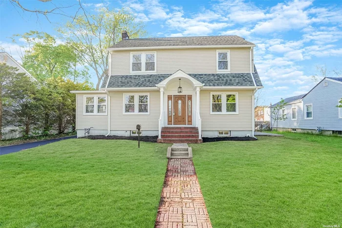 Renovated Colonial. Discover classic charm and modern updates in this colonial home. With wood floors, a cozy fireplace, and renovated kitchen and baths, it&rsquo;s a perfect blend of old-world elegance and contemporary comfort. Plus, there&rsquo;s a detached garage for added convenience.