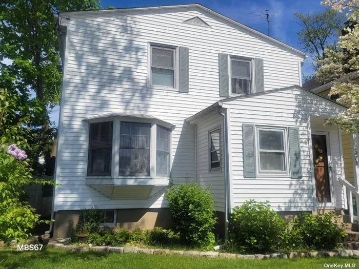 Welcome to the lowest priced historical house in desirable Woodmere. Charming Colonial home on dead-end block with three bedrooms and two full baths and gas cooking. Best value in town, come and make it your own.