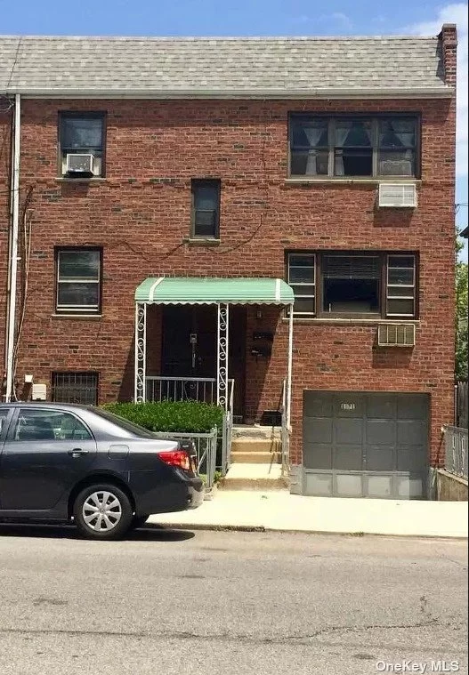 This legal two-family brick house is located in the quiet and beautiful Canarsie area. Each floor has a large living room, three bedrooms, and a beautifully finished basement with a separate entrance and exit to the backyard garden. The house has a garage.