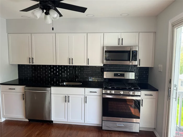 *THIS IS THE TOP LEVEL OF A HI RANCH* in the COMMACK School District Move into this 3 Bedroom/1 Full Bath/ BRAND NEW Eat in Kitchen/ Living Room/Dining Room// Washer & Dryer - with Deck Access. Central Air - Includes all utilities including WiFi. No Pets/No Smoking. Close to All.