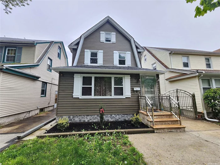 Lovely Detached 2 Family House in the heart of Queens Village, Private Driveway with 2 car garage plus storage, Finished Basement, Finished Attic. Paved backyard.