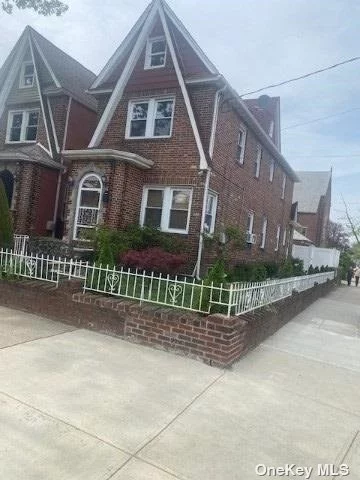 Excellent Brick Corner House, Finished basement, 1 car garage, Living room, Dining room, Eat in kitchen, 1Full Bath. Second floor 3 bedrooms, 1 bath and a finished attic.