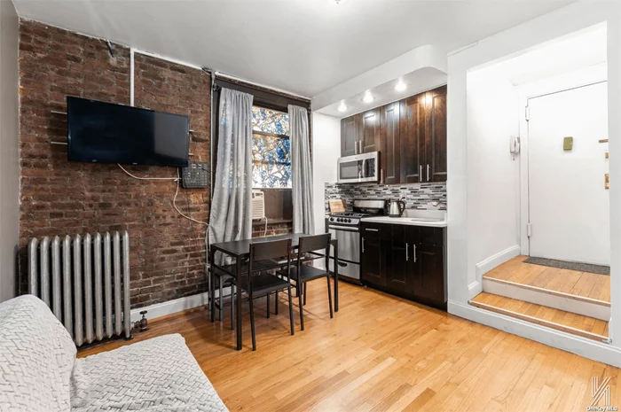 This fully renovated one-bedroom apartment in Astoria is exceptional and has the lowest maintenance in the building (under 1k). The unit features an open-concept kitchen/living room with beautiful hardwood floors as you enter through the foyer. The kitchen has stainless steel appliances, a granite countertop, and cabinets located above and by the fridge, allowing for more storage options. There&rsquo;s plenty of space for dining as well as relaxing on the couch. The exposed brick in the living area can also be found in the large bedroom. Spacious enough for a queen-sized bed, there are also two large closets. The modern bathroom has stylish ceramic tiles, sleek fixtures, and a window. The monthly maintenance fee is only $604.40, including heat, water, and taxes. You can easily access the charming courtyard, on-site laundry facilities, bike racks, and on-site security from this first-floor unit. The Acropolis is located in the heart of Astoria, close to Ditmars Boulevard and the N/W subway line. Plenty of restaurants, coffee shops, supermarkets, and entertainment options are nearby, including Astoria Park, which is just a 10-minute walk away. No pets, but co-purchasing is allowed. This is an excellent opportunity for first-time buyers or savvy investors!