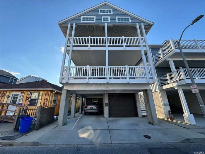 Stunning fema compliant raised house in heart of west end featuring two large balcony&rsquo;s with partial beach and bay views. cathedral ceilings and hardwood floors, built in 2019, with open plan top of the line kitchen, living room and dining area perfect for entertaining, gas line and grill on balcony. skylights, master suite with en suite bath and walk in closet. 3 guest bedrooms and an additional family area/den or office space. Additional multipurpose room for gym/office/ bedroom, den or theater, w.outside entrance and wetbar. covered parking for 2 cars and an attached garage.