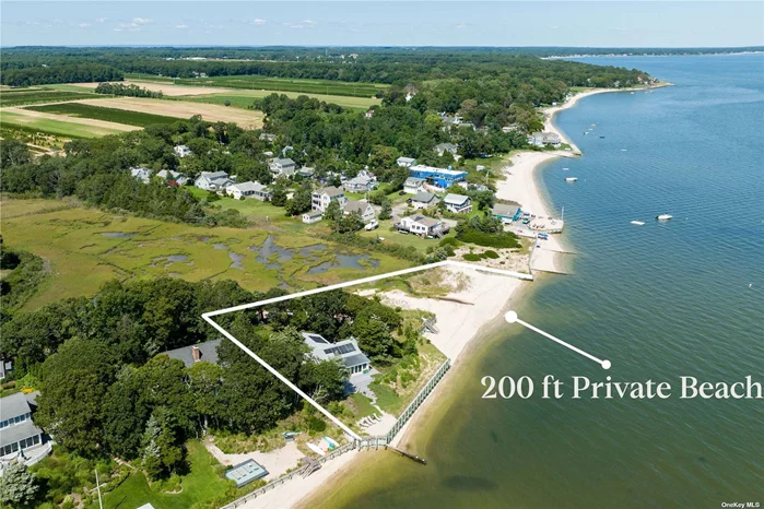 A standout among truly exceptional waterfront properties, 1521 Peconic Bay spans 1.6 acres with a substantial 200&rsquo;+ private sandy bay beach. The 3-bedroom, 2-bathroom beach house is perched above the Peconic with 270-degree water views and 300+ feet of bayfront. Offering incredible privacy and room to expand, the home exudes a captivating vibe and, after 30 years, is ready for its next owner to host dinner parties with breathtaking views from the elevated decks or camp out for the day on the private beach. A new kitchen, wood-burning fireplace, vaulted ceilings, and water views from every room enhance its allure. All just a stone&rsquo;s throw from vineyards, farmstands, golf, and more. This home is not just a residence but a lifestyle, offering serene living and exceptional entertainment possibilities in one of the North Fork&rsquo;s most sought-after locations.
