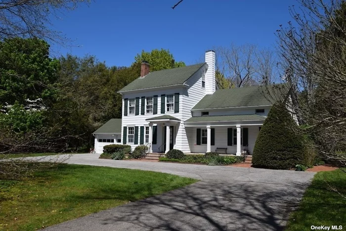 Welcome to this 1830 Historical Home on a shy 2 acre with large barn. Enter into a formal living room with wood burning stove, kitchen, huge sunroom with tons of light overlooking gold fish pond and lush gardens. The main floor also encompasses a family room with wood burning fireplace, half bath, and office/tv room with closet that can be used as a small bedroom. Upstairs are 3 bedrooms and additional room currently being used as an additional bedroom, full bath, and entrance to walk-up attic with plenty of space for for storage. This wonderland property is zoned for horses and is known for its many barn parties! Close to the protected Carmans River and the Wertheim National Wildlife Refuge. This property is made up of 2 separate lots, the main house sits on 1.21 acres with taxes of $10, 764.75, and there is a separate lot of .73 acres with taxes of $1142.42 which houses the barn for a total combined acreage of 1.94 & with taxes $11907.17