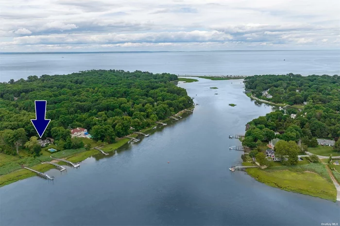 Astonishing Water-Front Colonial With Boat Dock!! 137 ft of Level Shoreline W/Full View of Conscience Bay- A Weather- protected and Safe Haven for Kayaking, Inner Tubing, Water Skiing, and Wakeboarding. Fixed Pier W/Open Grate Composite Decking & Seasonal Aluminum Ramp to Floating Dock. Less Than 10 Min Cruise to LI Sound. In this Home You&rsquo;ll Feel Like Royalty. Beautiful Hardwood Flooring, Large Living Room W/Cozy Fireplace and Enchanting Views Through Large Picture Window. Gorgeous Great Room W/Updated Kitchen, Breakfast Nook & Den area W/Gas Fireplace - Overlooks Backyard sanctuary With Sliders to Genuine Slate Patio. Gorgeous Updated Gunite IG Pool & Hot Tub, Privacy Landscaping... All Great for Entertaining or Tranquil Relaxation. Minutes from Old Field Lighthouse, Old Field Beach, and Frank Melville Park & Grist Mill. Enjoy All the Exceptional Dining, Shopping, and Entertainment Three Village Offers.