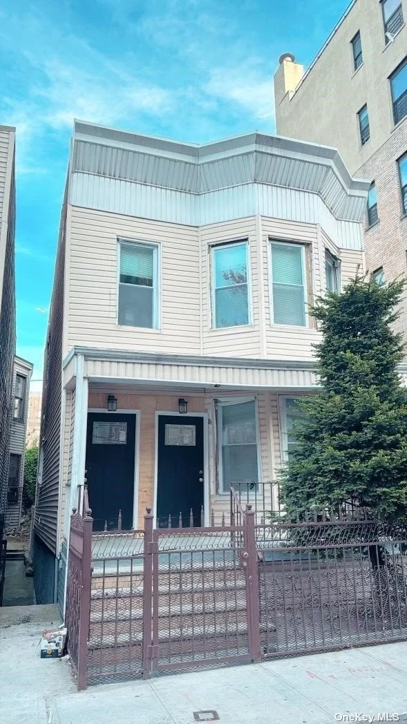 BEAUTIFUL FULLY RENOVATED LEGAL 2 FAM DET 6/5 3 FBTHS 2 BALCONIES FIN BSMT APARTMENT, KITCHEN WITH STUNNING WHITE KITCHEN CABINETS S/S APPLIANCES AND GRANITE COUNTERTOP