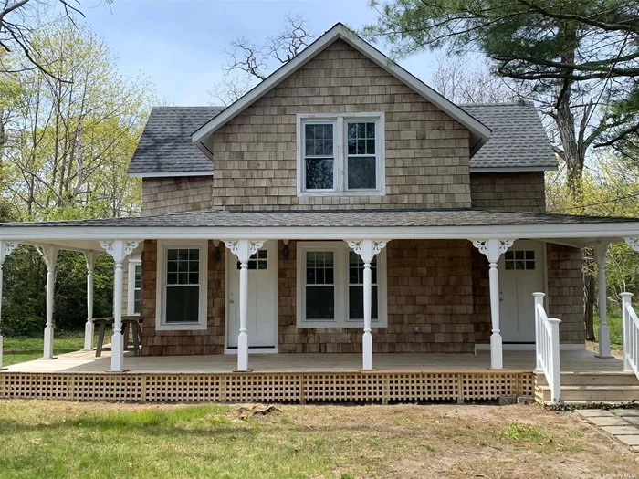 On The North Side Of Montauk Hwy Is Where You Will Find This Completely Remodeled Home Offering 3 plus Bedrooms, 2.5 Baths, New Custom Kitchen, Hardwood Floors, New Heating, Roof And Siding. A short drive to the beach and a short walk to town.
