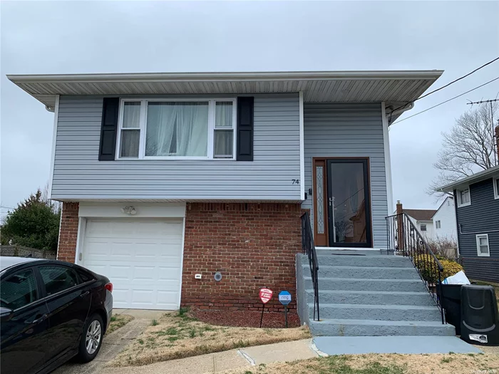Welcome to 74 Frankel Ave in Freeport, Nassau County. A Hi ranch single family home in a quiet neighborhood. This well maintained home features three bedrooms and a bathroom on both floors. Central Air keeps home cool in the summer