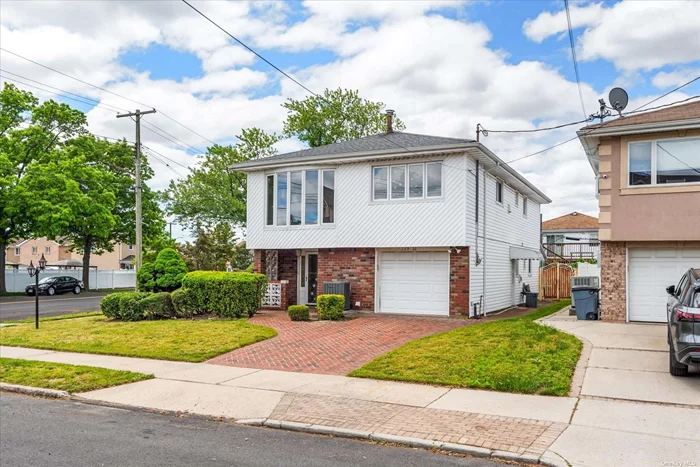 Corner Hi Ranch in the Heart of Howard Beach! This spacious home features living room, dining room, eat in kitchen, 4 bedrooms and 2 bathrooms, offering ample space for comfortable living. Complete with private driveway and 1 car garage.