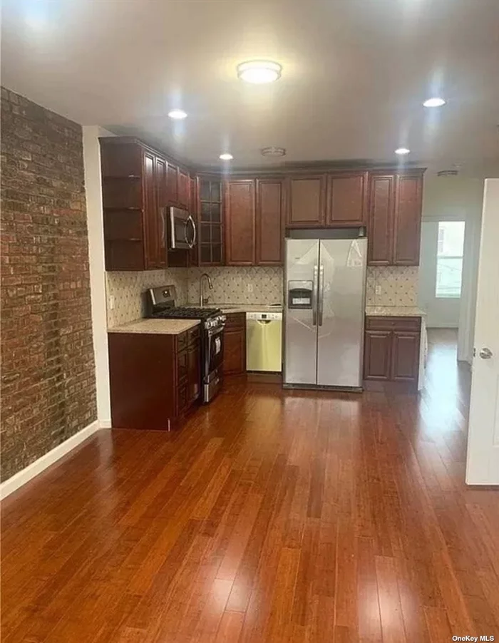 This exquisite 3-bedroom apartment on the second floor has been freshly renovated with a modern open concept kitchen, full bathroom, stainless steel appliances, and the convenience of a washer and dryer included, this apartment offers the ideal blend of style and comfort. Near public transportation: B12 and the A, C, 2 and 3 train. Close to Linden Park.Gateway mall 15 mins ride by bus or car.