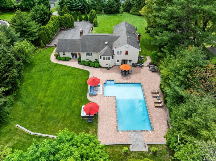 This newly renovated home is situated on a perfectly manicured flat acre of property, with an in-ground pool and hot tub, in the esteemed Village of Old Westbury.  The residence boasts an open layout with large windows throughout, allowing for ample natural light. The first floor contains a spacious living room, formal dining room, a newly renovated eat-in-kitchen with breakfast area, an oversized family room with natural gas fireplace & generous wetbar, a bedroom and full bathroom. The primary suite, with walk-in-closet & primary full bathroom, 2 additional bedrooms and an additional full bathroom make up the second floor of the house. The home&rsquo;s lower level is open, generously sized and partially above ground.
