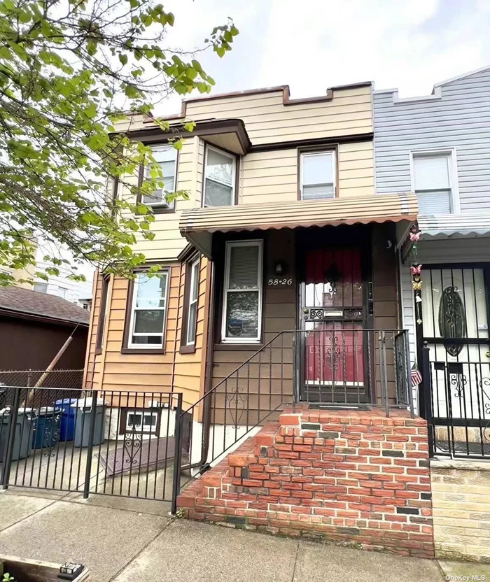 Maspeth semi-detached 2-family home with private parking on a long Irregular lot. 3 bedroom apt over 2 bedroom apt over full basement. Two electric meters and two gas meters. Gas heat. Close to PS 153.