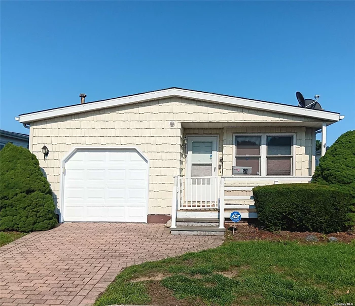 Enjoy Country club living in the country, this 5 room home with large rooms, the living room is 13 x 18 feet, the dining room is 12 x 13, the Primary Bedroom is 13 x 16 feet, The second bedroom is 9x13. Eat-in kitchen with stainless appliances and sliding door to the rear deck, updates Include: laminate flooring, hot-water heater sliding door and new roof shingles within the last 5 years, paving stone driveway. The front of the home was painted on August 11th. This is a well built modular home that needs some minor repairs, it is being sold as is. This is a land lease. Purchase must be all cash! The monthly fee for the new homeowner will be $1, 534 covers lawn mowing, leaf raking and snow removal, clubhouse with pool maintenance, and bus service. Greenwood Village plan on having their tree service company grind down the two tree stumps in the rear yard in November.