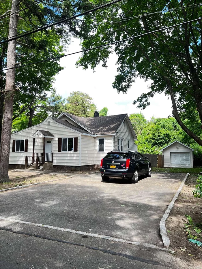 nice corner treed setting with fenced backyard and detached garage with full basement and outside entrance freshly painted 6-8-2024,  just recently remodeled in 2020, new roof installed 5-17-24 to 5-18-24. this home is move in ready.