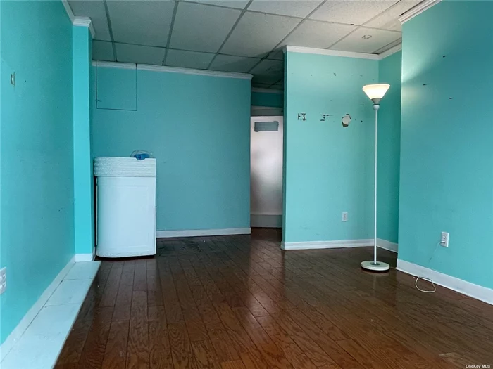 Price for $1, 250 per month plus share of utilities. Space with additional balcony. Prime Downtown Commercial Area. Three Stories Granite Building in Excellent Condition Across Street From Flushing Library. One Block From #7 Subway. Next to Long Island Railroad Station.