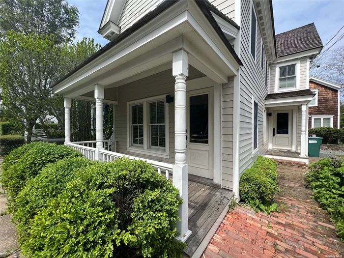 Charming and updated Farmhouse in the heart of Greenport Village. This home features an open floor-plan on the main level w/ EIK, 1/2 bathroom and laundry Room w/ hardwood floors throughout. Second level features 3 bedrooms, full bathroom and balcony off rear of house. Close proximity to all that Greenport Village has to offer!