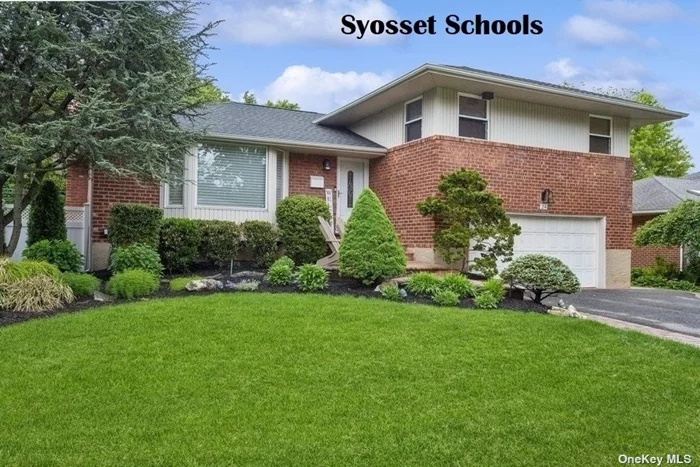SYOSSET SCHOOLS!!! Nestled On A Prime Mid Block Location In Sought After Woodbury Hills This Gem Of A Home In Plainview Has The Added Bonus Of Being In The Syosset School System. This 3-bedroom, 2.5-bath home boasts large rooms with plenty of natural light, offering an open and inviting space for relaxation and entertaining. Kitchen Has many New Stainless Steel Appliances including Dishwasher Stove & Oven. Beautiful Flooring Throughout. Wood Under All Carpeting. Beautiful Pavered Walkway & Stoop. Large Den With Slider Overlooks Professionally Manicured Yard with Bilevel Trex Decking.. New Roof Newer Gas Heating System 200 Amp Electrical Hook Up (Transfer Box) For Generator. Close to Schools, Parks, Shopping and Transportation Star rebate For Syosset Schools $1404