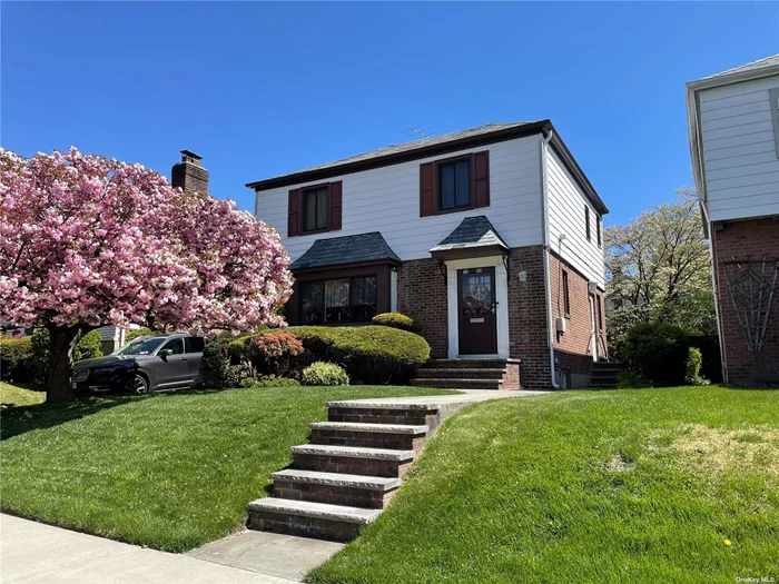 Make This Lovely Colonial Yours! Curb Appeal; Wood Floors Throughout; Private Parking; One-Car Garage;Central Air; All Necessary Amenities Within Close Proximity AS-IS Sale