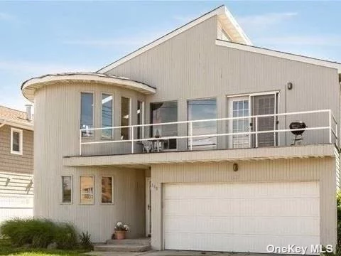 This Contempoary home is located just seconds away from the beach, offering a beachside living experience. This single family property consists of two living areas, each with its own unique features. The upper level consists of three bedrooms and 1.5 bathrooms.It boasts a beautiful open floor plan with a bright and airy atmosphere. The Kitchen is equipped with stainless steel appliances and spacious countertop. This single family home has Skylights and Oceanviews* With proper permits can be used as a Mother/Daughter. The Upper area is all Open Bright and Airy* Also has Oceanviews from Home and Your Own Private Deck. The Kitchen seamlessly connects to the spacious Living and Dining Room area, promoting an open concept design. Additionally, the upper area features a front deck with ocean views, providing a perfect spot to relax and enjoy the scenery. There is also a spacious backyard, offering more Outdoor Space. The lower area consists of two Bedrooms and one Bathroom, as well as a Washer and Dryer for convenience. Overall, this contemporary single family home provides a Comfortable and Stylish living environment with its open floor plans, spacious layout with ample bedrooms, and beautiful outdoor areas. Its close proximity to the Atlantic Ocean makes it an excellent choice for those seeking a Beachside Lifestyle. Fireplace and New Playground Direcly across the Street*