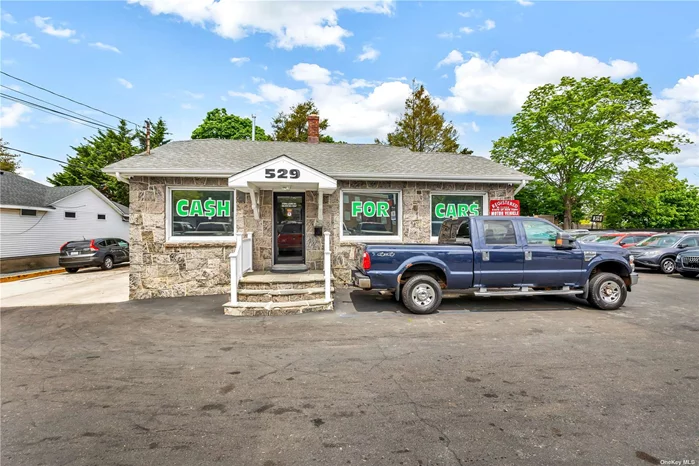 Renovated Commercial Property And Building. Auto Sales Lot. Includes 3 Hydraulic Lifts, Compressor, Ceiling Radiator, Security Alarm System, Storage Room, 3 half Baths, lobby and Office Rooms. Located On High Volume Traffic Road. Zoned C-6 Multi Use