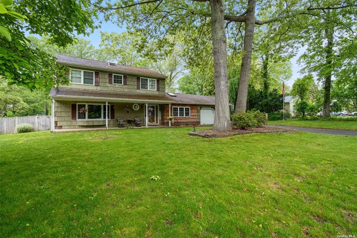Huge 4 bedroom, 2.5 bath home situated on over 1/2 an acre in Shoreham-Wading River Schools Large EIK, Oversized formal dining room , full basement, In Ground Sprinklers
