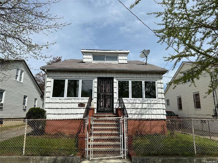 Fully detached on a 40x100 lot. Large yard which is ideal for entertaining. There is a full basement and a detached garage. Down the block from Baisley Pond Park. This is a Fannie Mae HomePath Property. Make this your forever home!