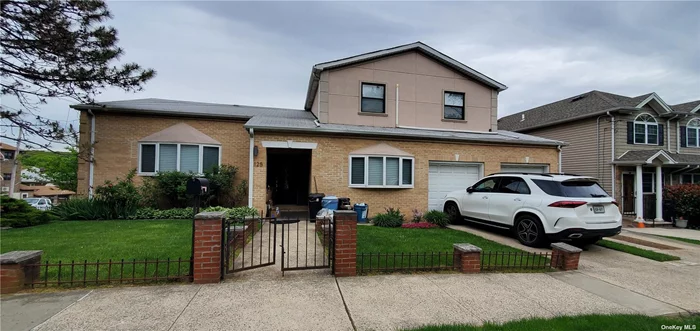 Detached Mother and daughter style 2 family house with 2 cars garage. Main house has 4Br, 2.5 bath large Eik, large Living room den, full finished basement (walk to the back yard) Rental apt has 3br, 2 full bath duplex style