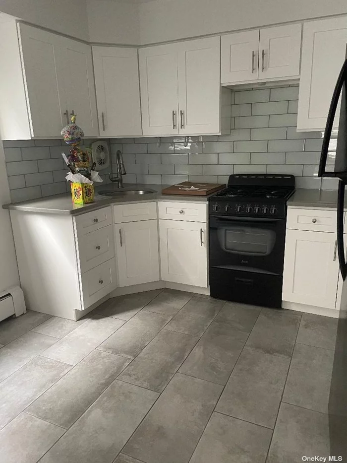 Bright & Sunny 1 Bedroom Apartment. Updated with new floors. Eat in Kitchen. Near Little Neck LIRR. Tenant pays cooking gas, electric and heat.