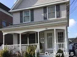 Completely Updated 1st Floor 1 Bedroom Apartment. Access to Basement with Washer & Dryer. Kitchen with Dining Area with Slider to Beautiful Backyard with Deck. Central Air Conditioning, Central Vac, Gas Heat, Hardwood Floors. Minutes to LIRR, Village,  Restaurants & Shopping. Pet (Dog/Cat) Allowed.