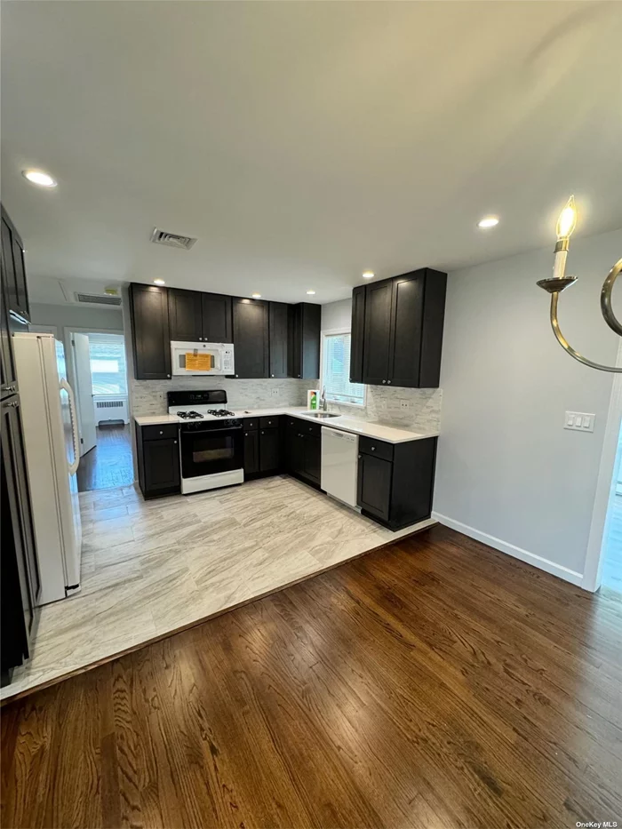 Welcome To This Beautiful Newly Renovated Two Bedroom One Full Bath Ranch Eat In Kitchen Custom Wood Cabinetry New Appliances Granite Countertops Recessed Lighting Wood Floors Washer And Dryer Private Entrance And Driveway With Oversized Yard