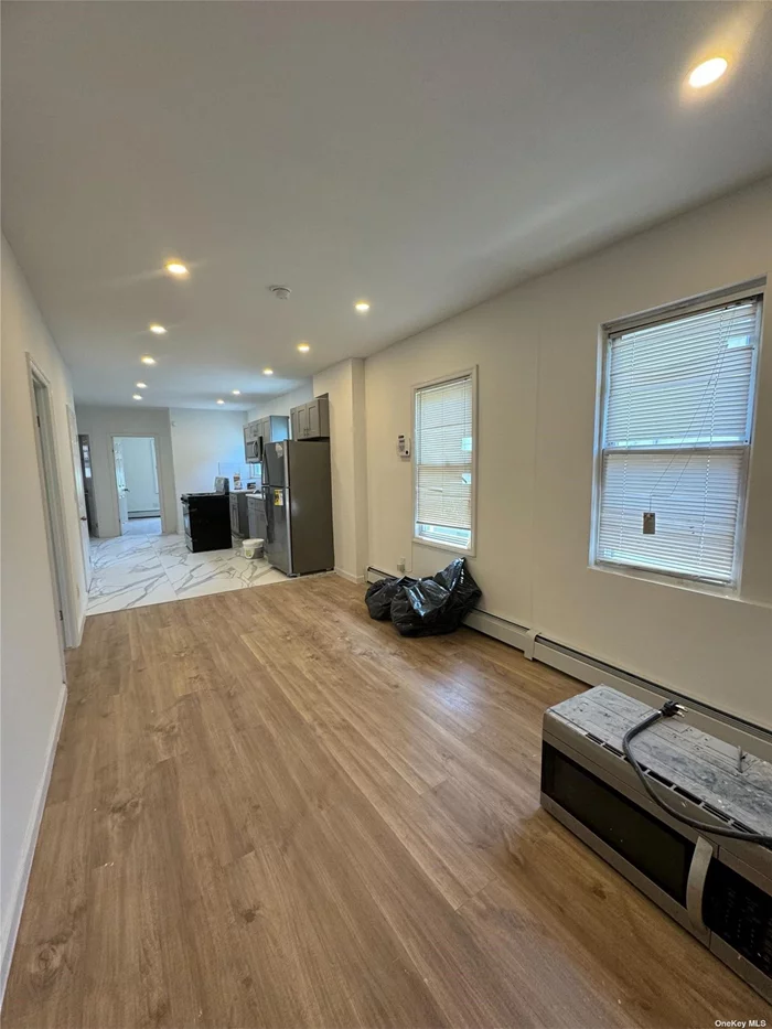 Brand new 3 bedroom apartment on the 1st Fl of a 2 family home. open kitchen concept. Nice size bedrooms with closets in each, Private entrance with a front balcony. Parking is available for extra charge,