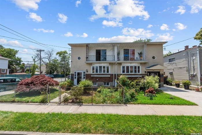 This is the Best two-family home in Rosedale, Queens, featuring 8 bedrooms, 6 baths, a renovated first floor, wall-to-wall carpet, and a well-manicured lawn on a corner lot.