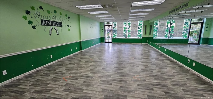Spacious storefront with front and back entrance, private parking lot in rear. Currently used as dance studio. Can be retail or office. Busy street located near restaurants, parkways and LIRR.