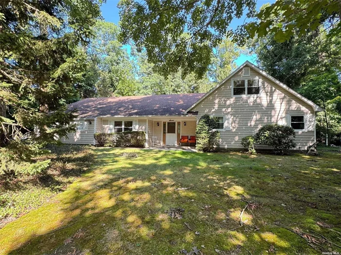 Nestled within the serene neighborhood of Setauket, NY, this stunning post-modern home at 7 Cumberland Path exudes elegance and charm. As you approach the entrance, you are greeted by a meticulously manicured front yard and a charming pathway guiding you toward the front door. The spacious layout and cathedral ceilings create an airy and inviting atmosphere throughout the home. The main living area features an open-concept design,  All bedrooms are generously sized and offer ample closet space, ensuring comfort and privacy for family members or guests. The partial unfinished basement offers more storage space and convenience for maintaining. The outdoor area is offering a serene backyard oasis with a spacious deck, lush landscaping, mature trees. This space creates a sense of tranquility and privacy, perfect for relaxation or entertaining. The home is equipped with central air conditioning, natural gas heating, and hot water supplied by stand-alone system. Located within the Three Village School District, including Setauket Elementary School, Paul J Gelinas Junior High School, and Ward Melville Senior High School, this residence is conveniently close parks, beaches and schools, enhancing its appeal. Overall, 7 Cumberland Path embodies a perfect blend of architectural excellence and contemporary living, offering both comfort and refined living at its finest. This home is coming soon to the market, providing a rare opportunity to own a piece of paradise in Setauket, NY.